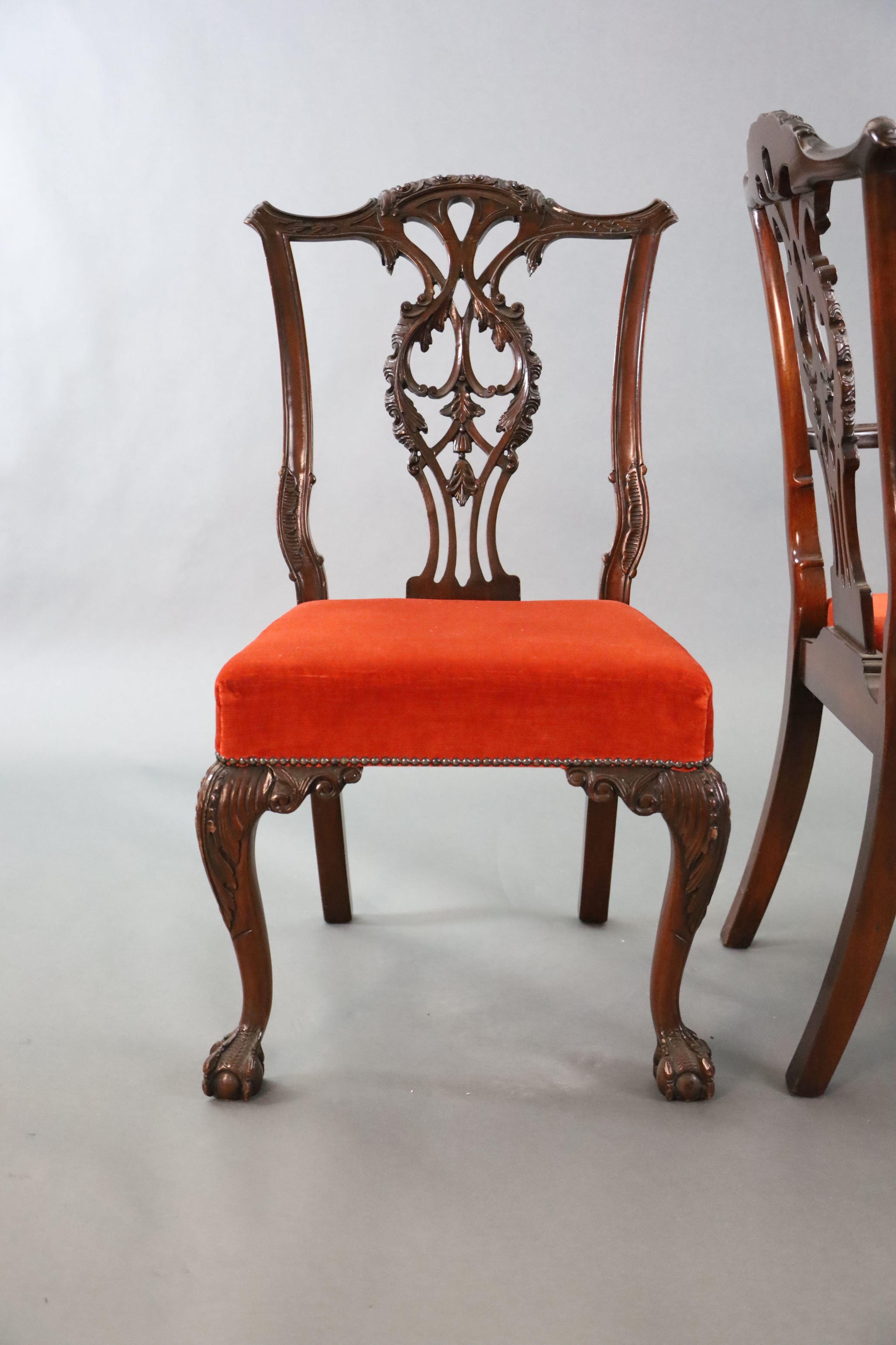 A set of eight Chippendale Revival mahogany dining chairs, carvers W.2ft D.2ft H.3ft 4in.
